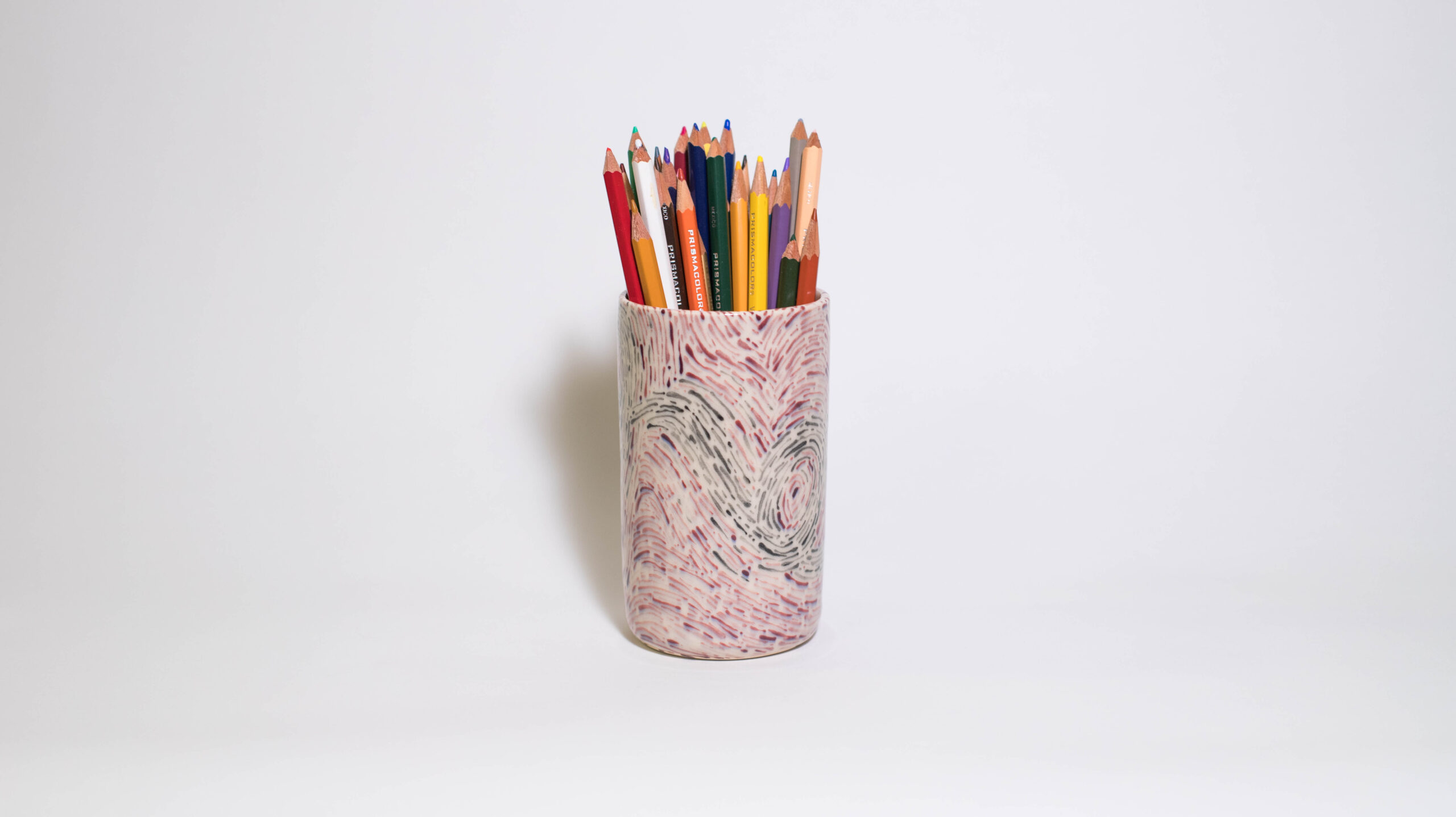 Container in Black and Purple Wiggles - Image 1